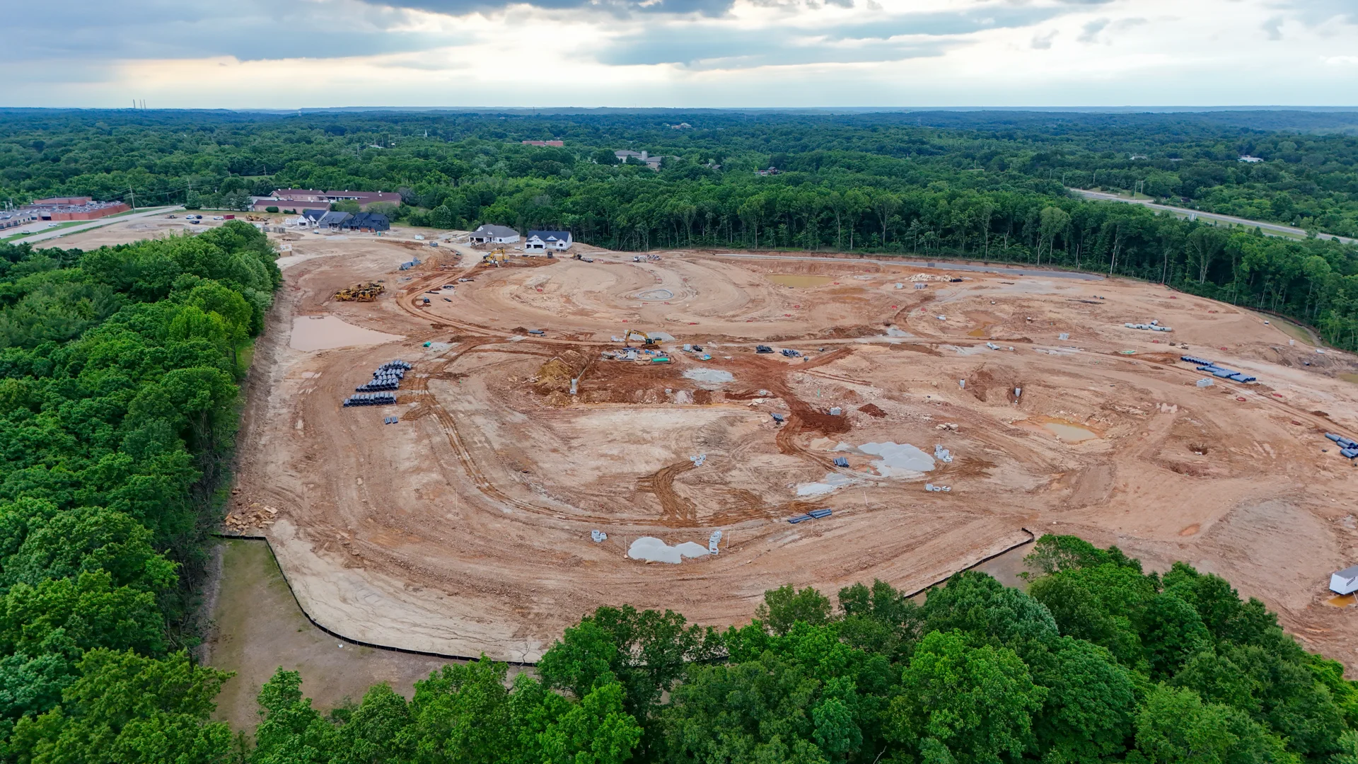 Sunset aerial view of The Reserve at Wildwood new construction neighborhood in Wildwood, MO — new homes by McKelvey Homes